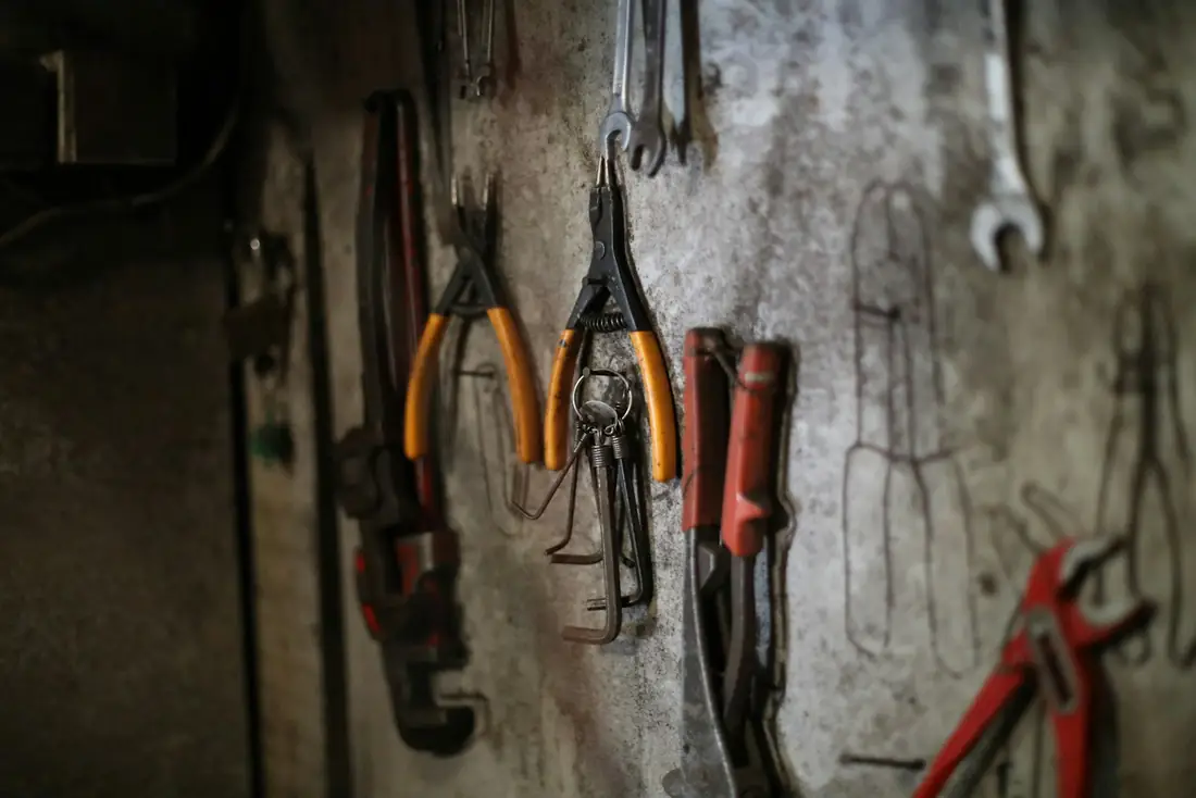 Motorcycle workshop where fasteners are fitted