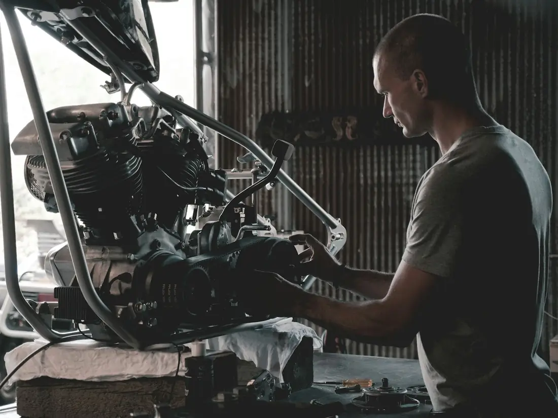 Motorcycle workshop where fasteners are fitted