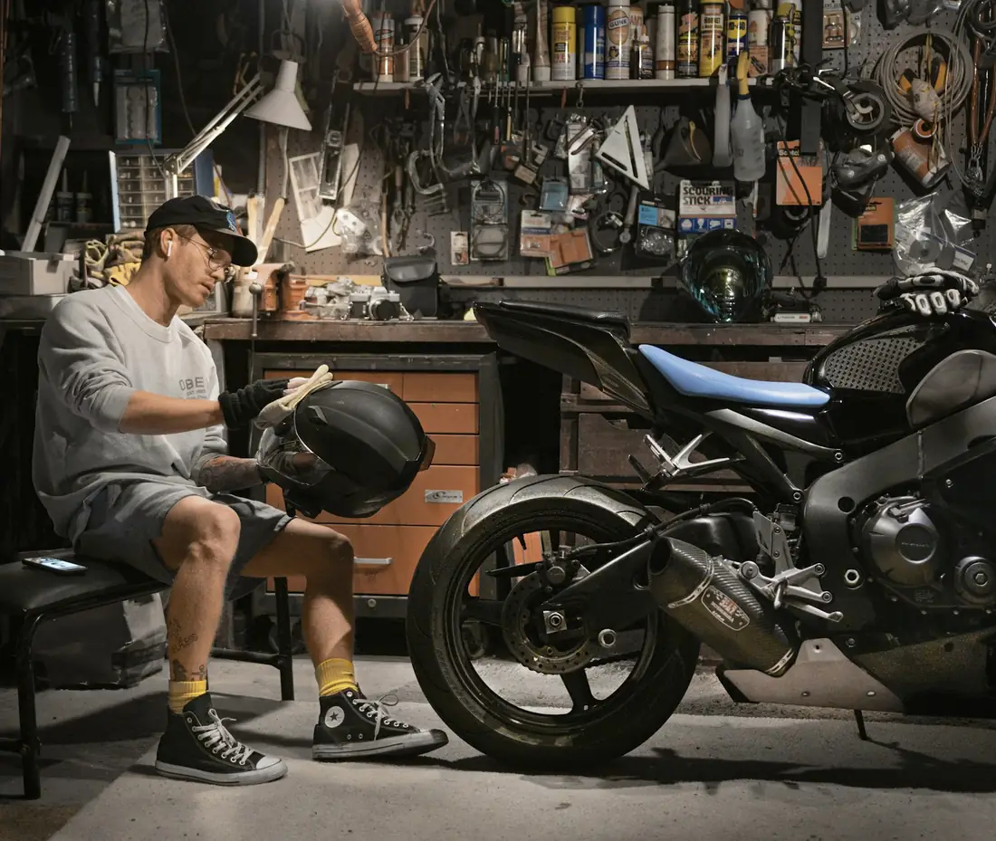 Motorcycle workshop where fasteners are fitted